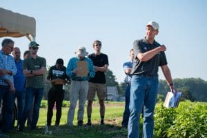 Kurt Steinke, MSU associate professor of soil fertility and nutrient management gives a talk surrounded by potato farmers.