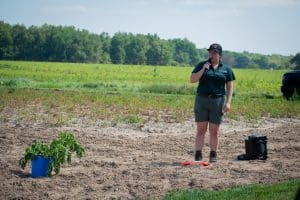 Jaime Willbur, MSU assistant professor of integrated disease management in potato and sugar beet production pictured giving a talk in a potato field.